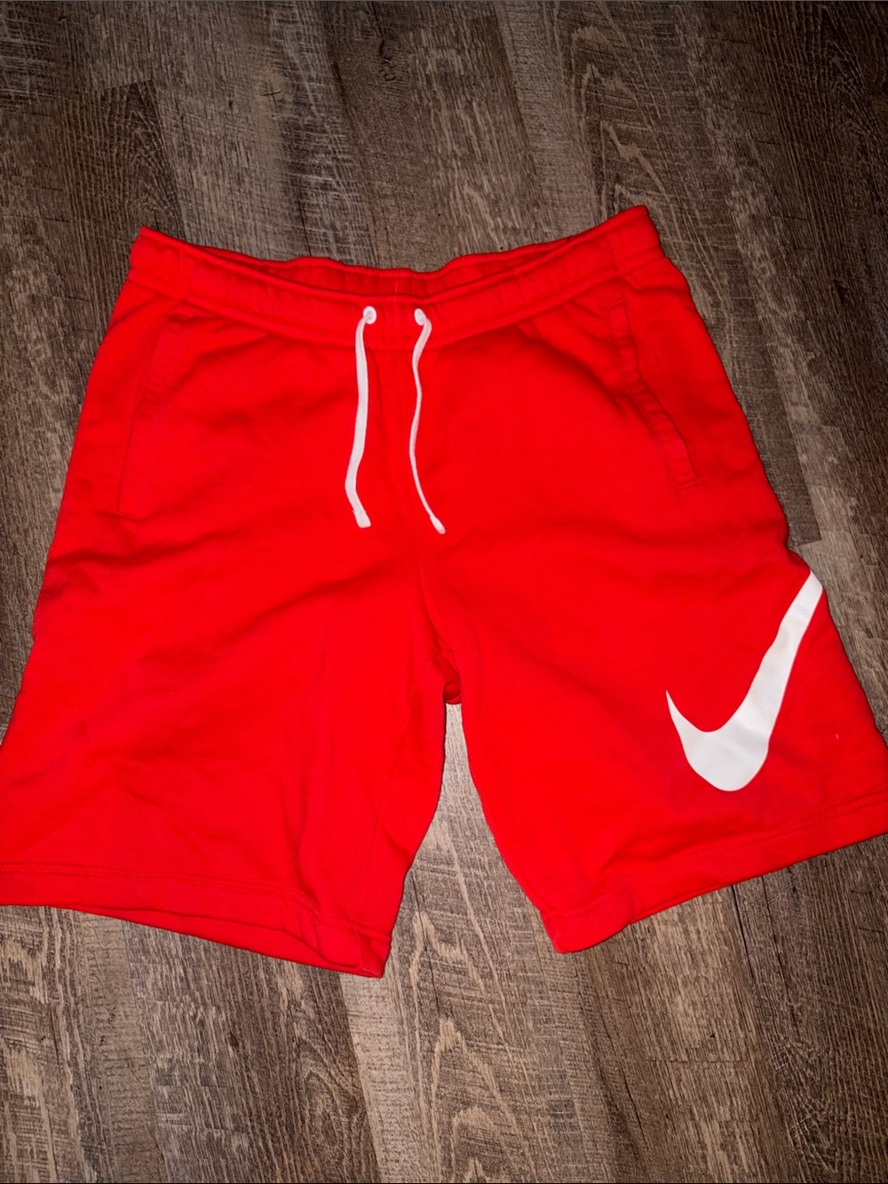 Nike Men's Red Athletic Shorts with White Swoosh